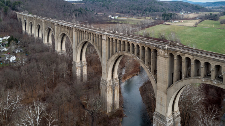 Aerial view of the Tunkhannock Viaduct with fields and winter trees in the background