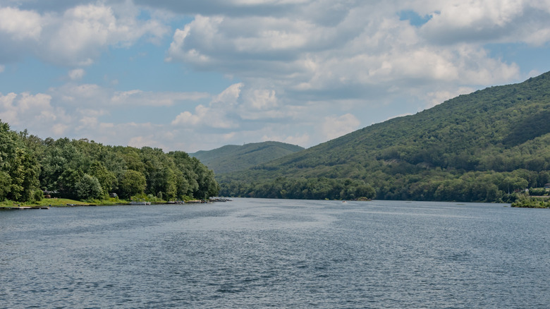 Sunny day on the Susquehanna River with lush hills in the background