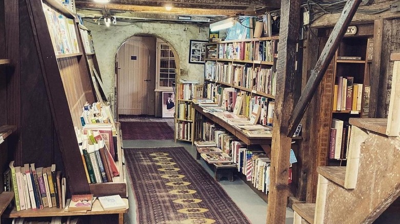 Shelves on rustic walls at Baldwin's book barn