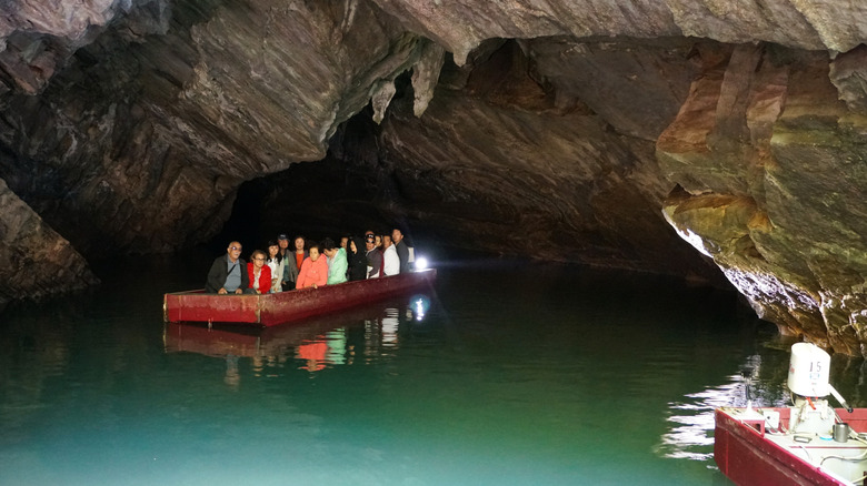 A boat floats through Penn's Cave in Pennsylvania