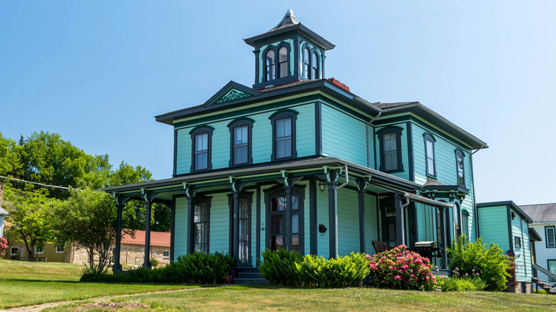 well-kept turquoise Victorian mansion in Tidioute