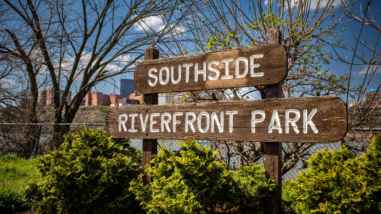 Wooden sign that reads 
