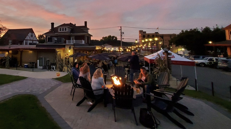 Outdoor seating of Straub Brewery and Tap Room at sunset