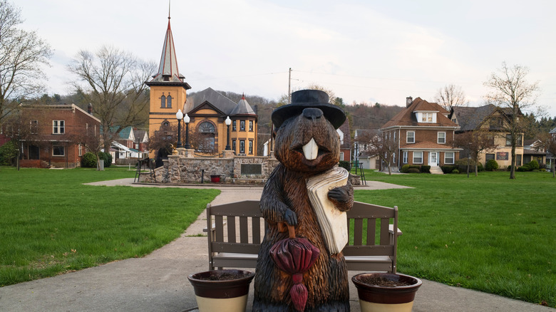 Punxsutawney, Pennsylvania with a groundhog statue and park in the foreground