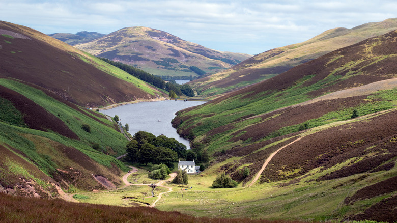 Reservoir between the rolling hills of Pentland Hills Regional Park outside Edinburgh