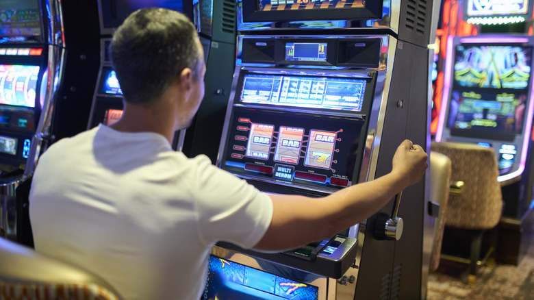 Man playing slots