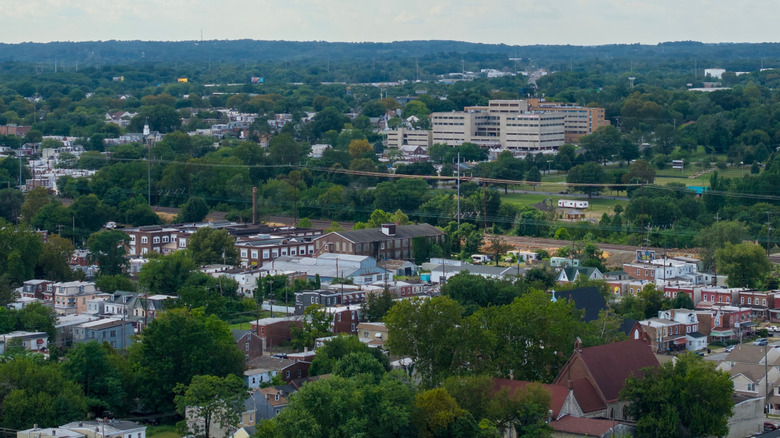 Aerial view of Chester, Pennsylvania, with homes and buildings surrounded by trees
