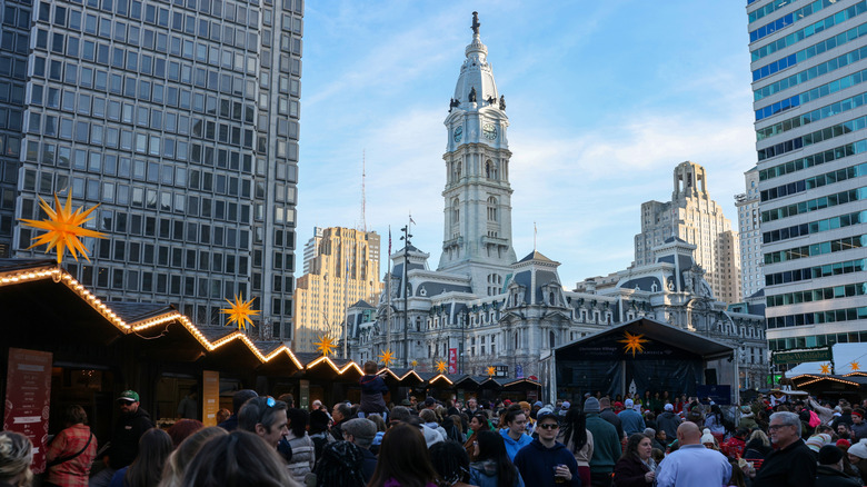 The Christmas Village in Philadelphia with City Hall in background