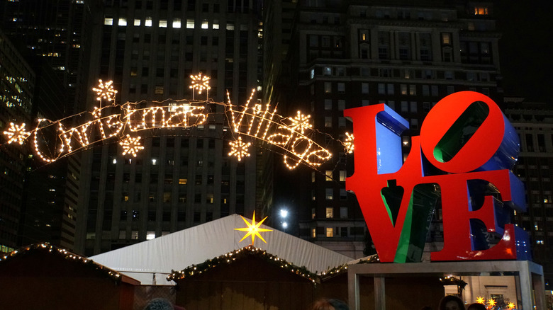 LOVE sculpture next to the Christmas Village in Philadelphia