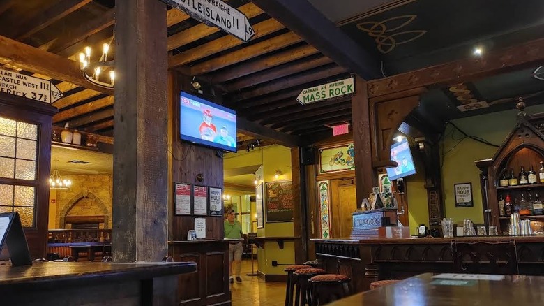 The cozy, wooden interior of Tir Na Nog bar in Philadelphia