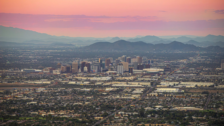 picture of the greater Phoenix area, with mountains and sunset