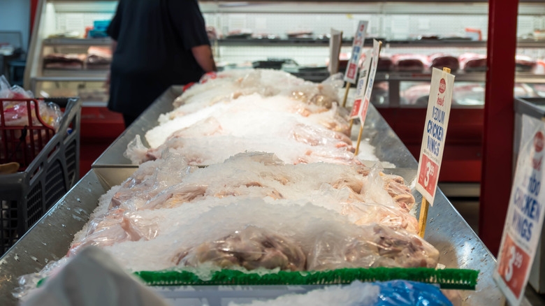 An ice tub full of fish and chicken at Wholey Market in Pittsburgh