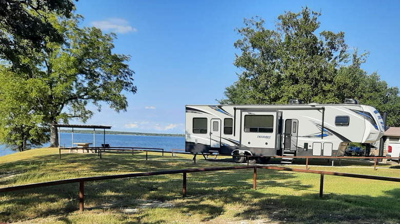 Magnolia Beach with RV parked along the shore.