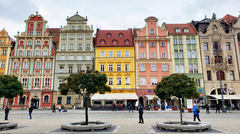 A row of colorful houses in an Old Town European square