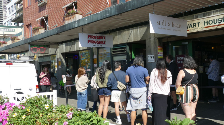 A line of people waits outside Piroshky Piroshky's shop in Seattle.