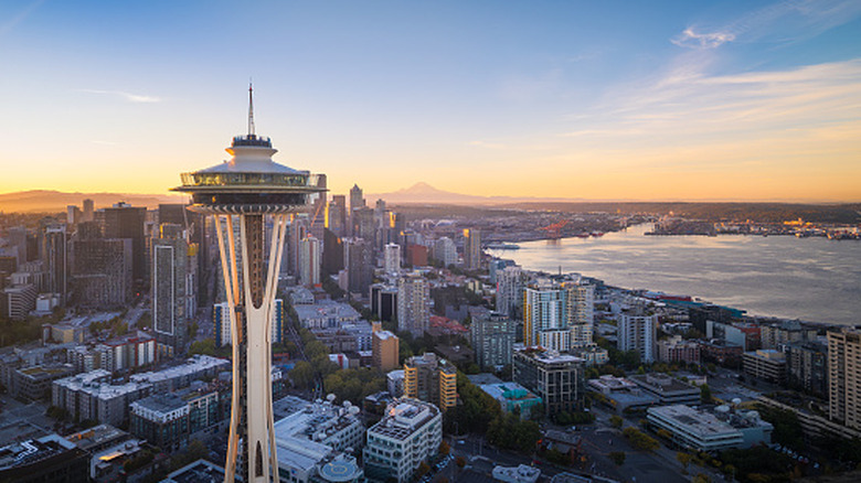 aerial view of the Seattle Space Needle observation deck and the city's waterfront and Puget Sound