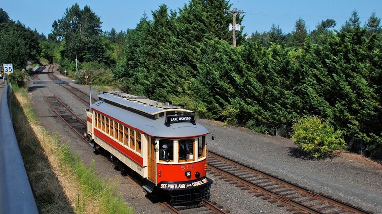Replica of a vintage trolley car on the Willamette Shore Trolley line driving through Oregon