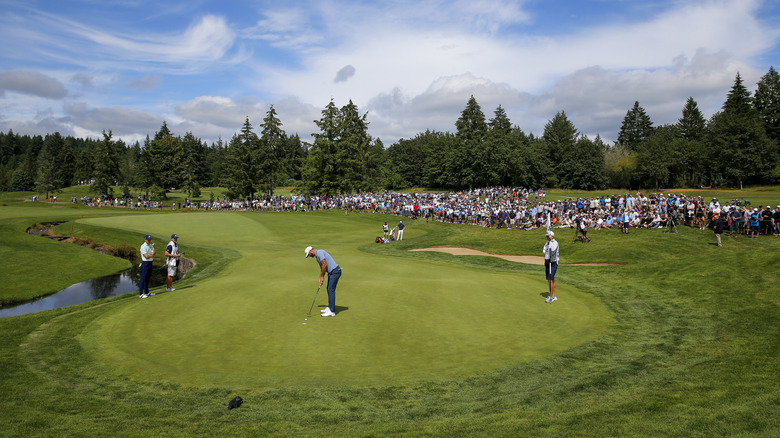 Team Captain Dustin Johnson of 4 Aces GC putts during the LIV Golf Invitational - Portland at Pumpkin Ridge Golf Club in North Plains, Oregon.