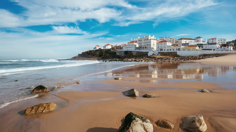 Small coastal village overlooking a sandy beach