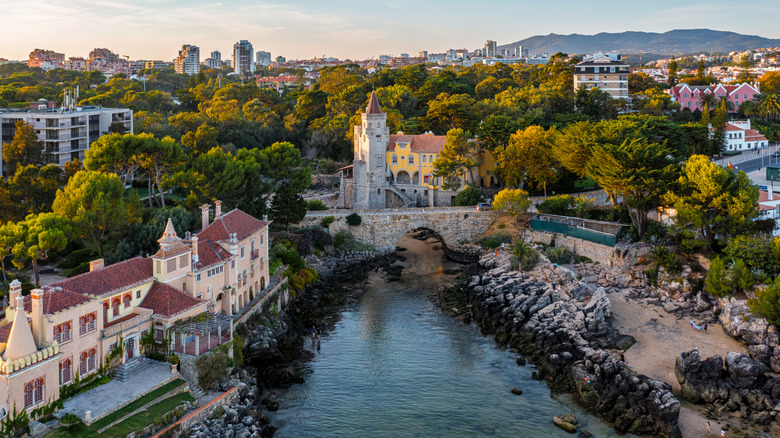 Aerial view of the picturesque coastline with old palaces and manors of Cascais, Portugal