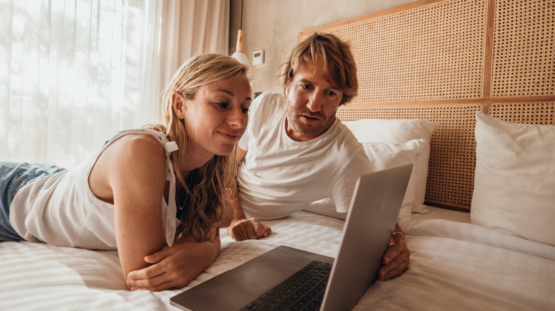 Couple looking at a computer