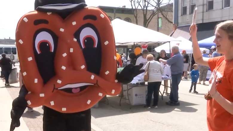 Person in pretzel costume at Pretzel Fest in Freeport, IL