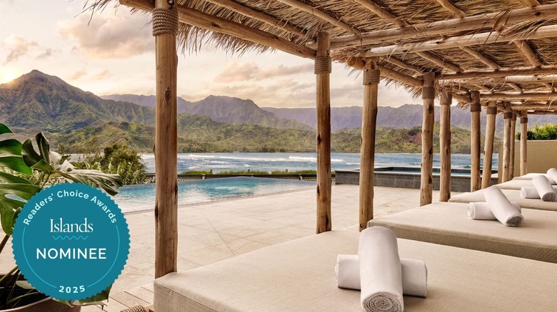 Cabanas by adult pool with mountain and water views at 1 Hotel Hanalei Bay