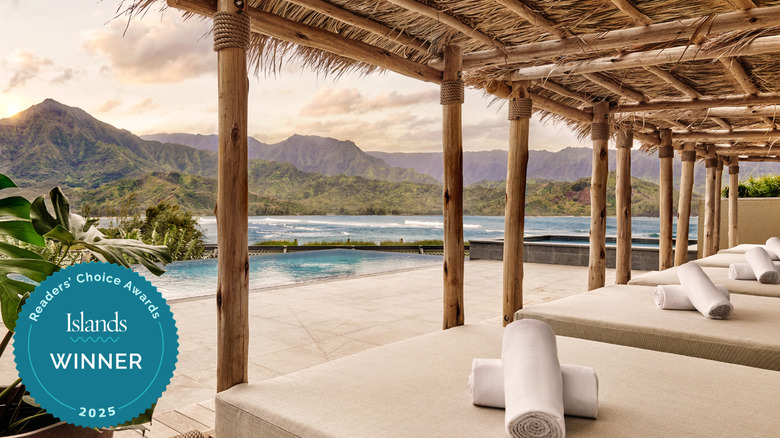 Cabanas by adult pool with mountain and water views at 1 Hotel Hanalei Bay