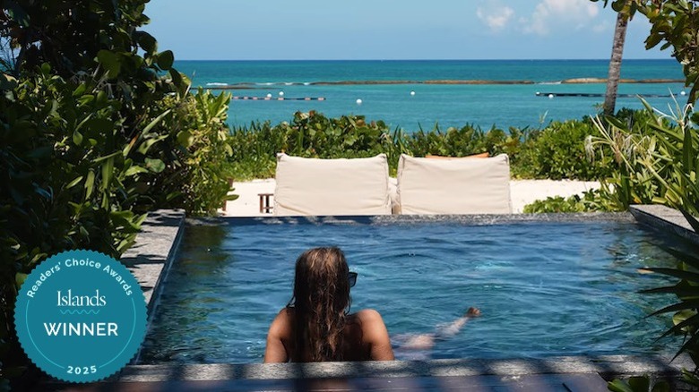 A woman soaking in a private pool overlooking the ocean at Banyan Tree Mayakoba