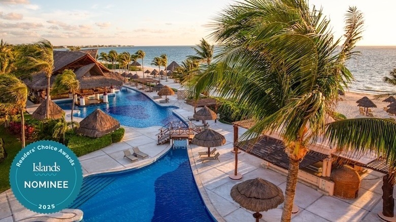 Excellence Riviera Cancun pool with beach backdrop