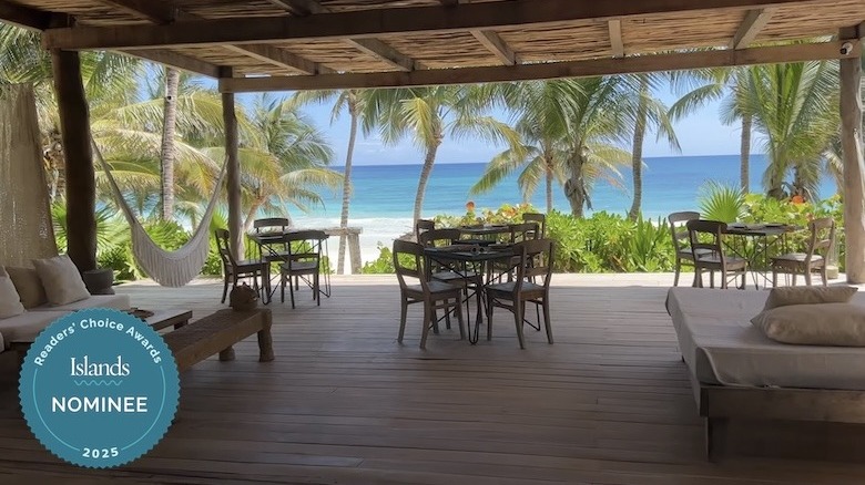 An open air lounge area overlooking at the ocean at La Valise Tulum