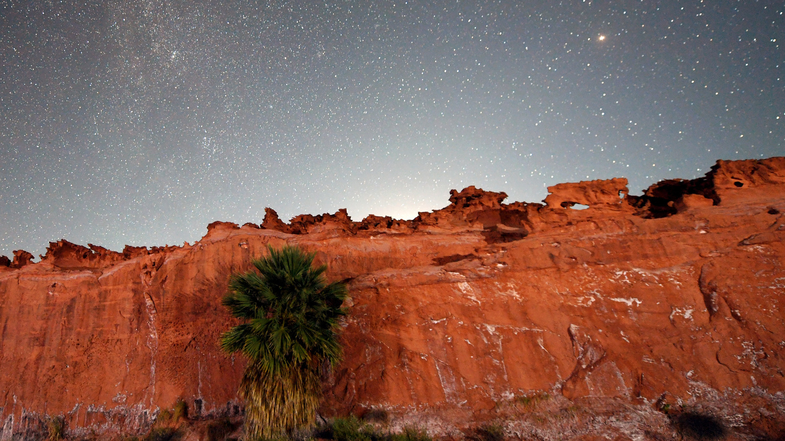 Red Rocks And Ancient Petroglyphs Paint A Striking Desert Landscape At ...