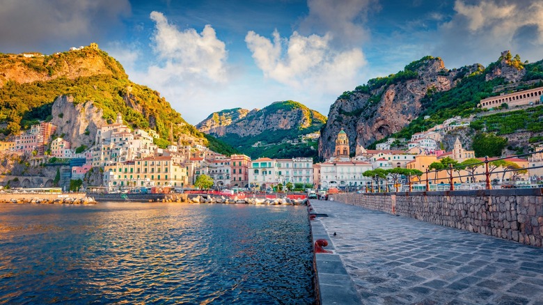 A European town on the water surrounded by mountains