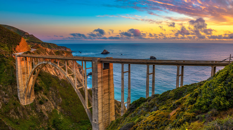 Sunset view of PCH, Bixby Creek Bridge, and the Pacific Ocean in Big Sur