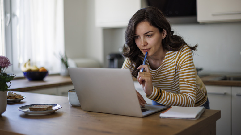 Woman doing research online