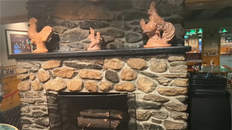 Quaint animal statues above fireplace at Wright's Farm Restaurant in Burrillville