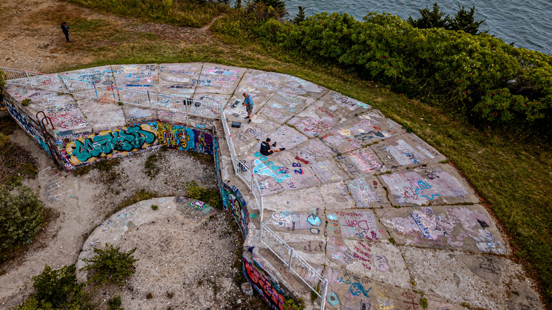 Aerial view of graffiti-covered remnants of Fort Wetherill in Rhode Island
