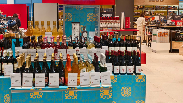 Wine bottles at an airport duty-free shop