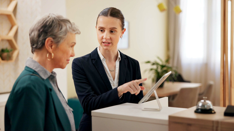 Person checking into a large hotel