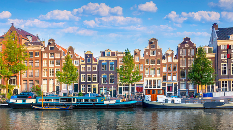 Amsterdam canal houses and boats