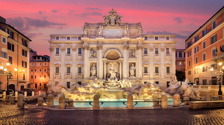 Iconic Trevi Fountain in Rome at sunset