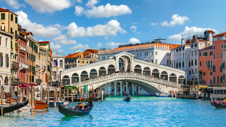 The famous Rialto Bridge on the Grand Canal of Venice