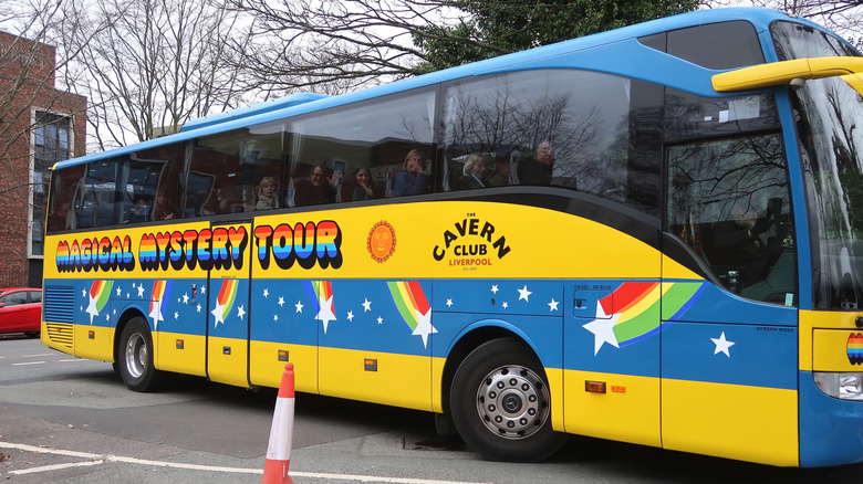 Colorful tour bus full of Beatles fans