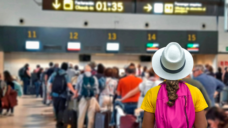 People waiting in line at the airport