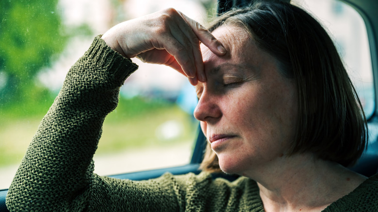 Woman with motion sickness