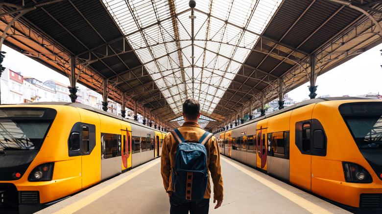 Person on a train station platform in Europe