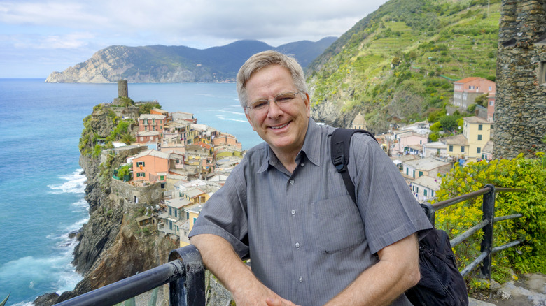 Rick Steves with a backpack