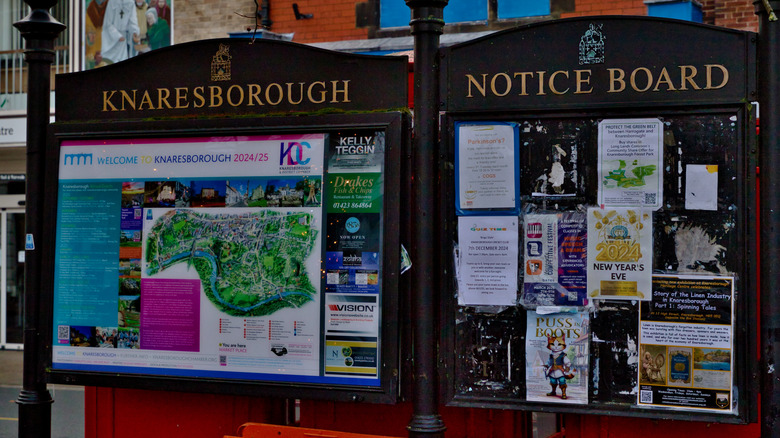 Community board with flyers of community events in the U.K.