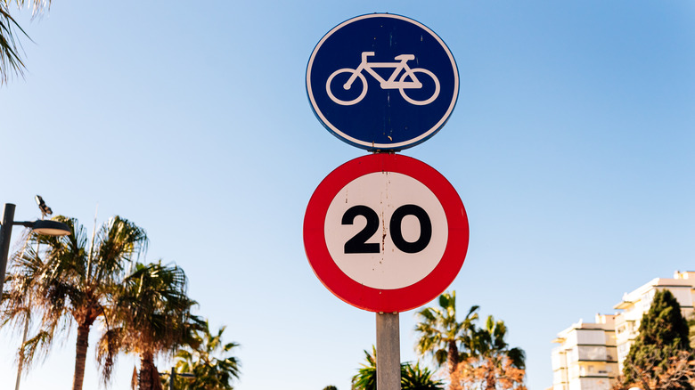red and blue signs on European roads