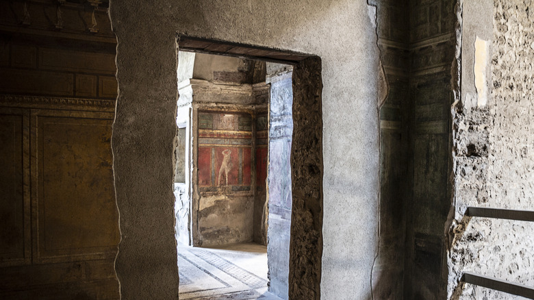 Doorway leading to a room with frescoes in Pompeii